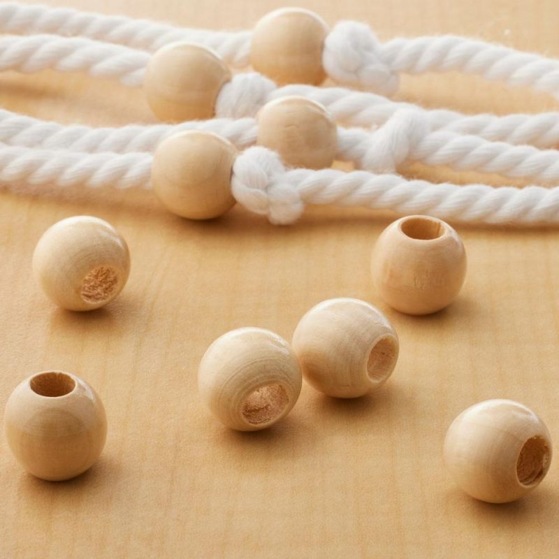 12 Packs: 28 ct. (336 total) Natural Wood Round Beads, 16mm  |   Macrame Macrame Macrame